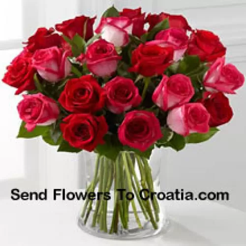23 Roses ( 11 Red And 12 Dual Toned Pink ) With Seasonal Fillers In A Glass Vase