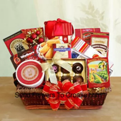 Send your wishes this Thanks Giving with our gourmet gift basket designed just for the occasion. Our delightful tray basket holds Walker's shortbread cookies, Ghirardelli chocolate assortment, Jelly Belly jelly beans, butter toffee pretzels, truffle cookies, cheese swirls, smoked almonds, cheese, English tea cookies, water crackers, and a Ghirardelli chocolate bar. The variety makes it perfect when you want to make sure there is something for everyone to enjoy. She will love the elegant presentation with a big bow on the front, and can keep the wicker basket to use long after the food has been enjoyed (Please Note That We Reserve The Right To Substitute Any Product With A Suitable Product Of Equal Value In Case Of Non-Availability Of A Certain Product)